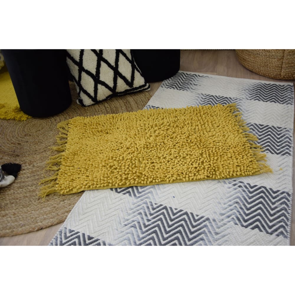 Tapis de bain coton uni à franges ocre 50x70cm - Maisons du Monde