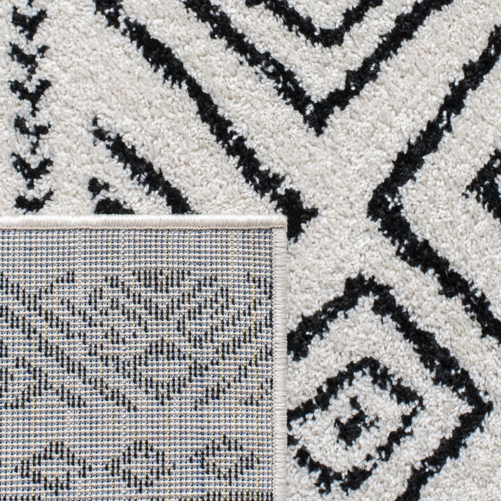 Tapis bohémien en polypropylène blanc/noir, 91 x 152 cm