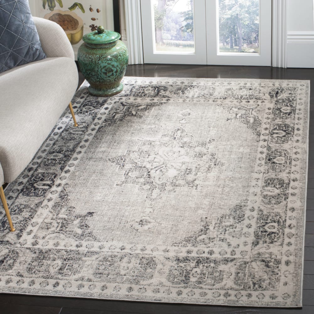 Tapis lumineux et moderne en polypropylène gris/blanc, 91 x 152 cm - Maisons du Monde