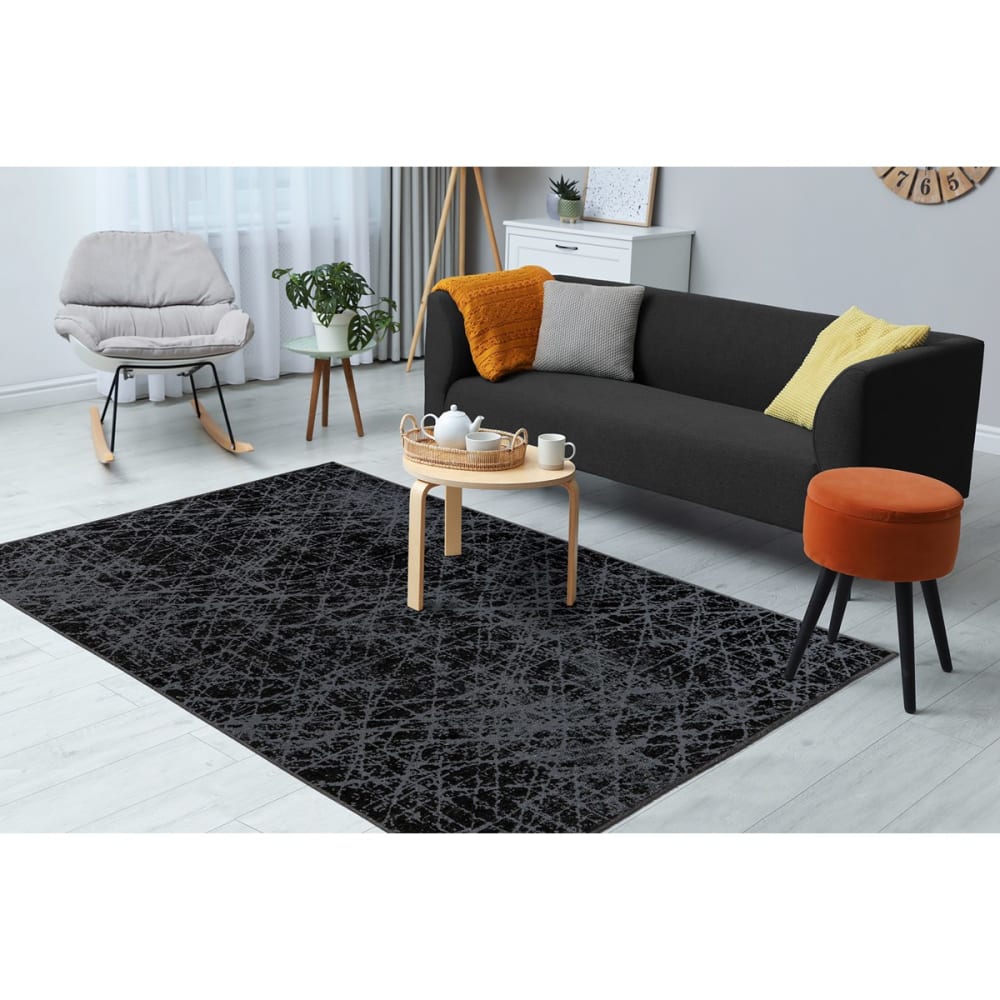 Tapis de salon en polyester noir 120x170 cm - Maisons du Monde