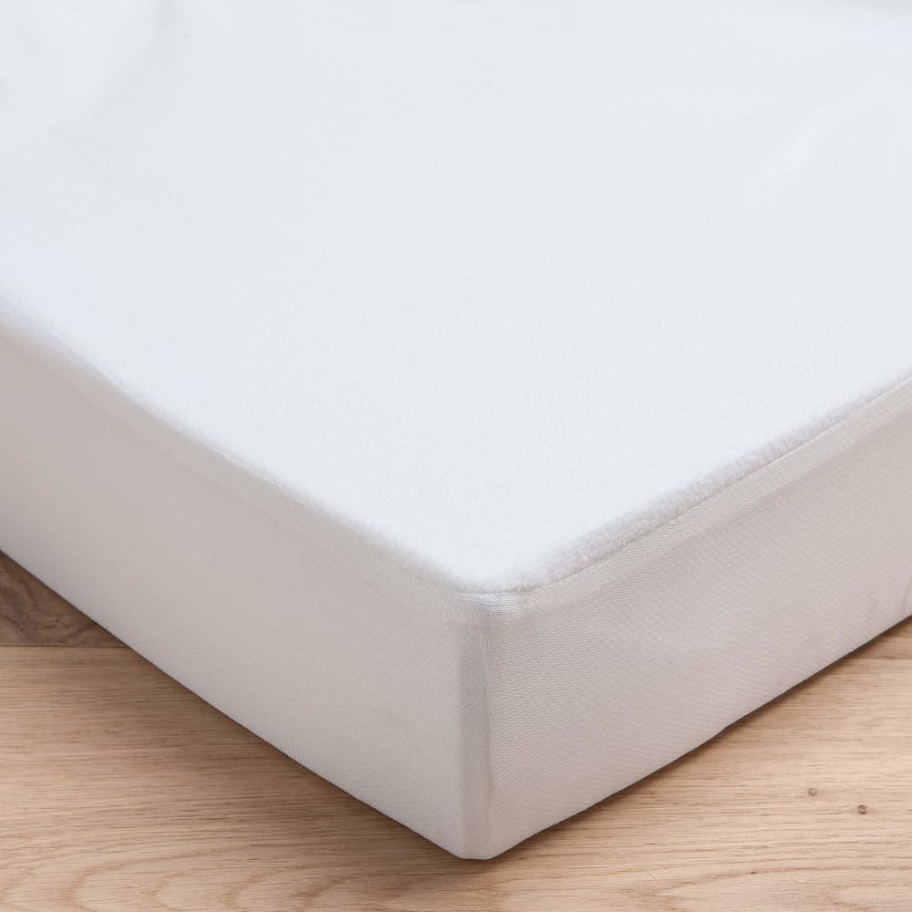 Alèse de lit bébé blanc en éponge 60x120 cm - Maisons du Monde