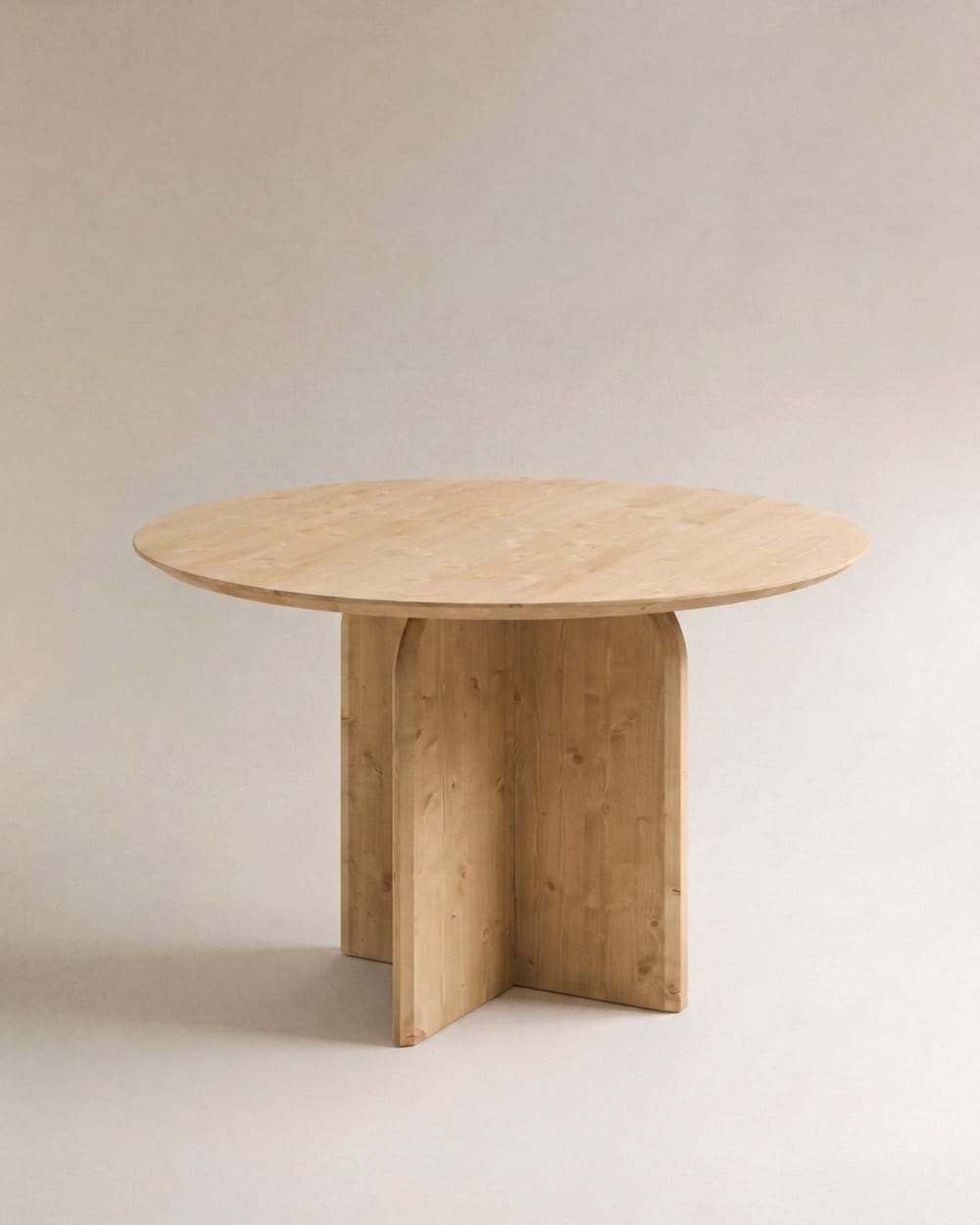 Mesa de comedor redonda de madera maciza en tono medio de 110x75,2cm