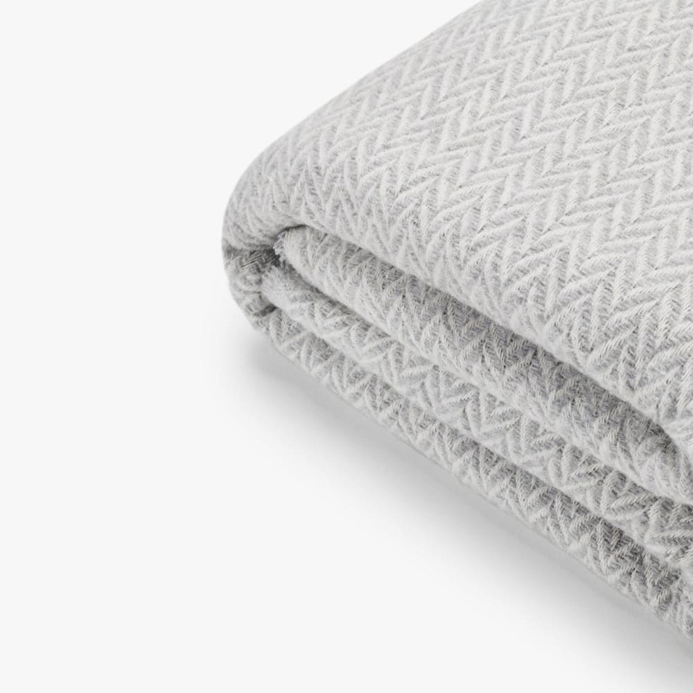 Manta de algodón espiga decorativa gris 180x125 cm para sofá y cama - Maisons du Monde