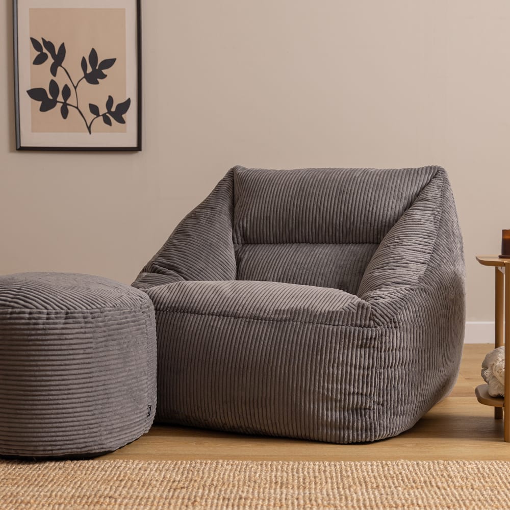 Pouf fauteuil avec repose-pied rond velours côtelé gris anthracite
