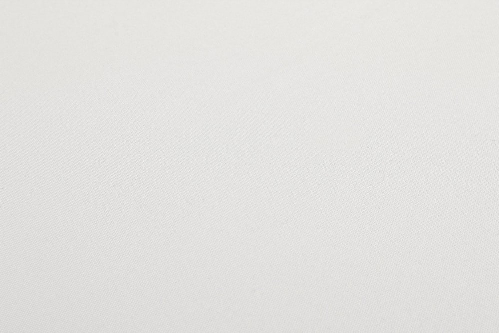 Cuscino rondo in tessuto beige - Bizzotto