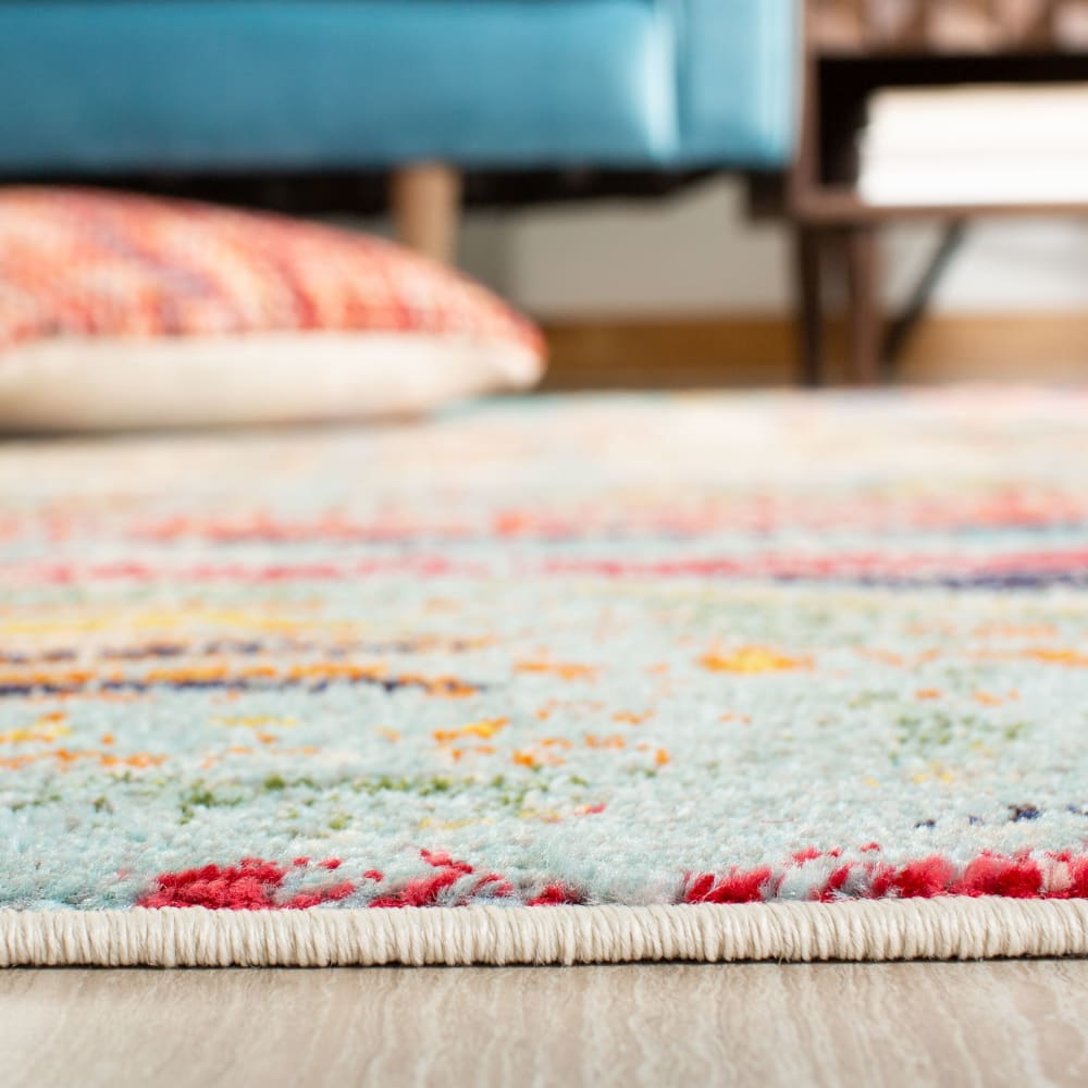 Tapis contemporain en polypropylène bleu/orange, 91 x 152 cm — vue 3