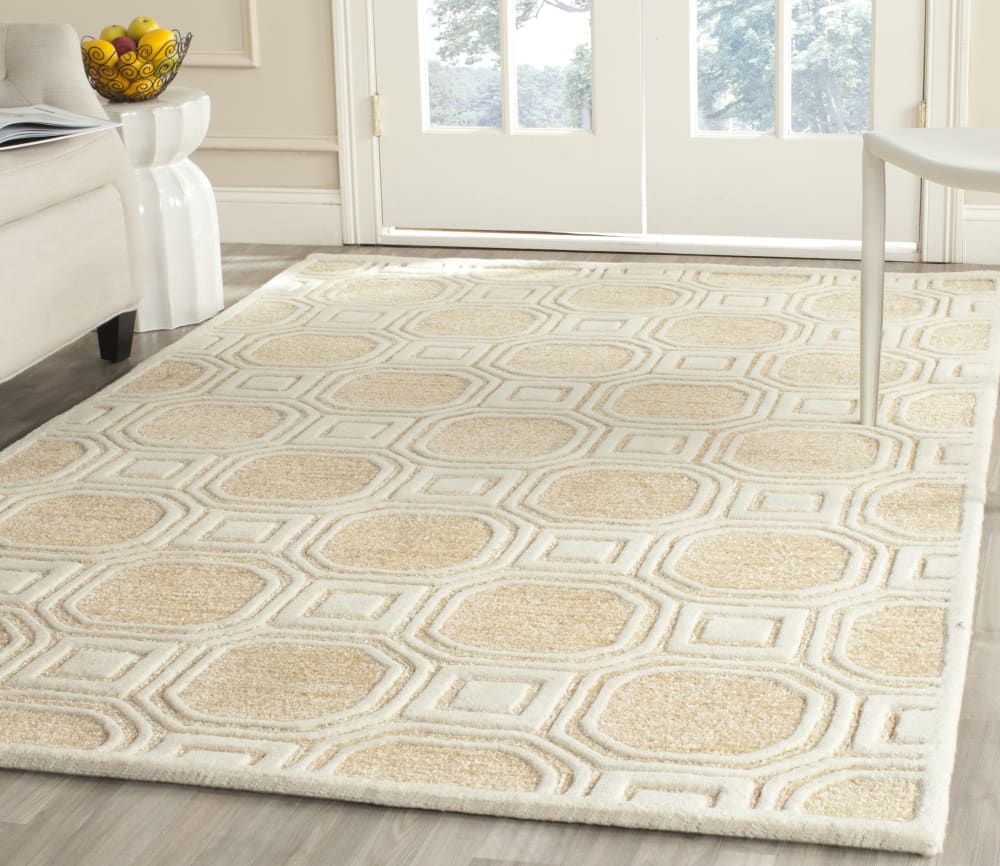 Tapis géométrique en polyester beige, 122 x 183 cm - Maisons du Monde