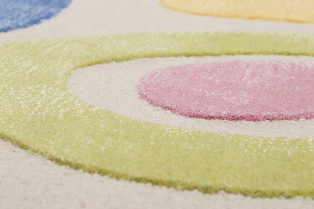 Tapis enfant à poil ras et motifs colorés fond beige 110x170
