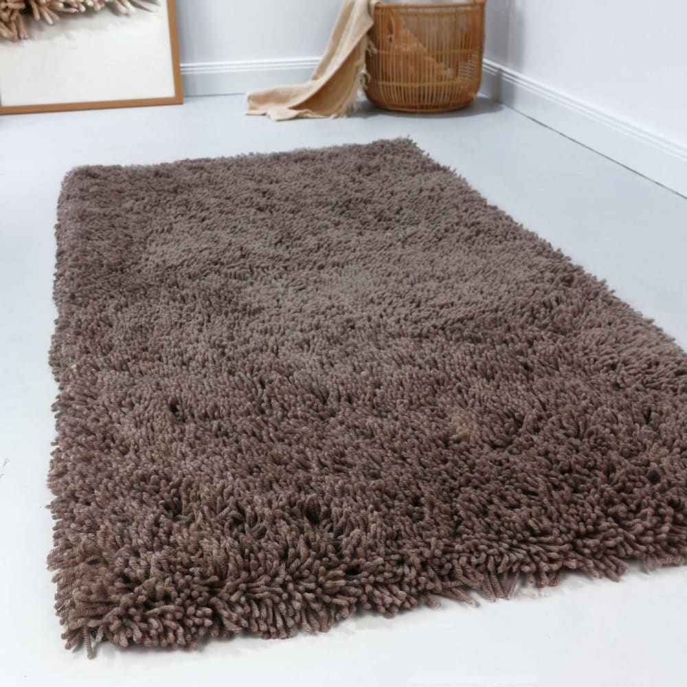 Alfombra de lana suave y confortable, pelo largo, marrón 70x140 - Maisons du Monde