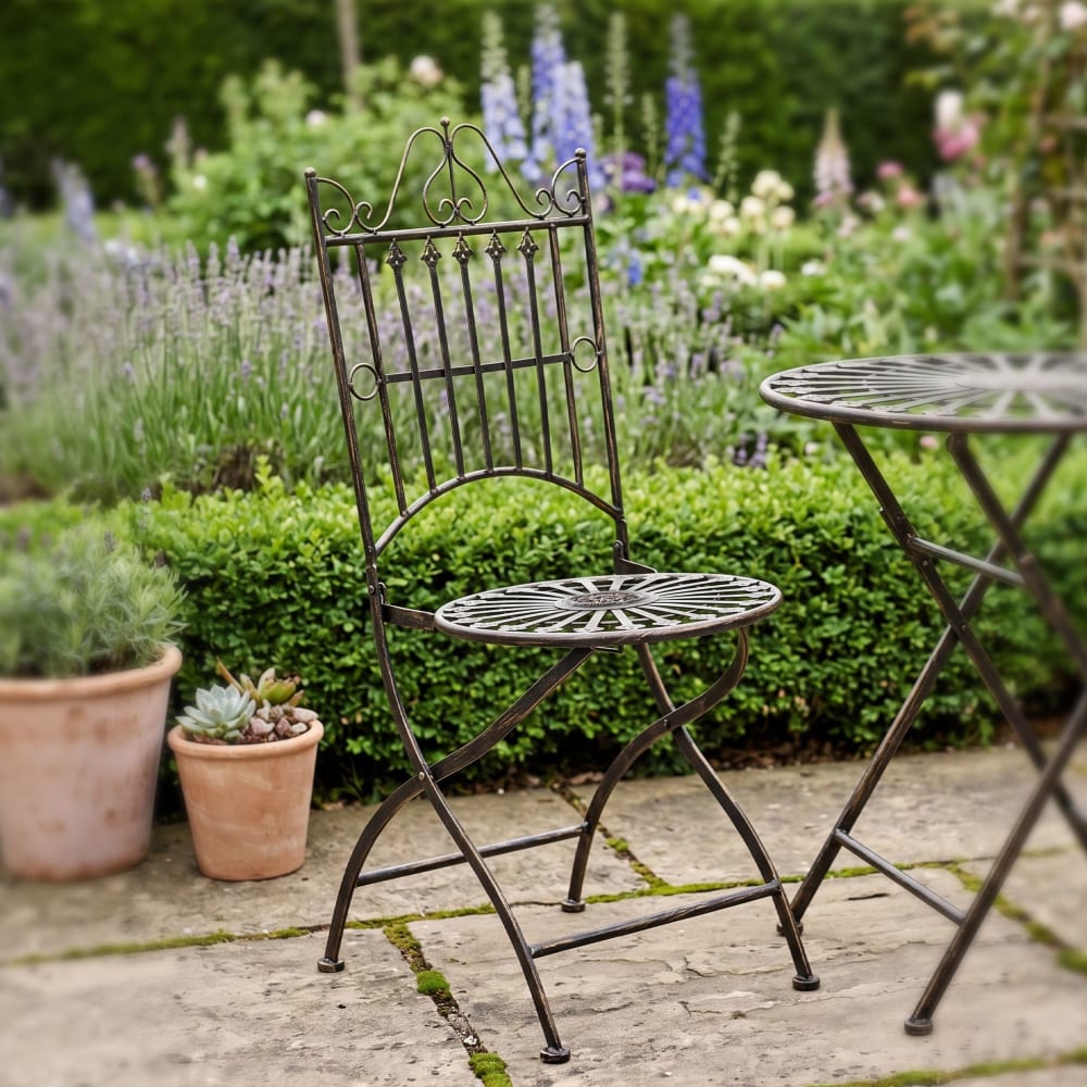 Silla de exterior plegable en metal bronce