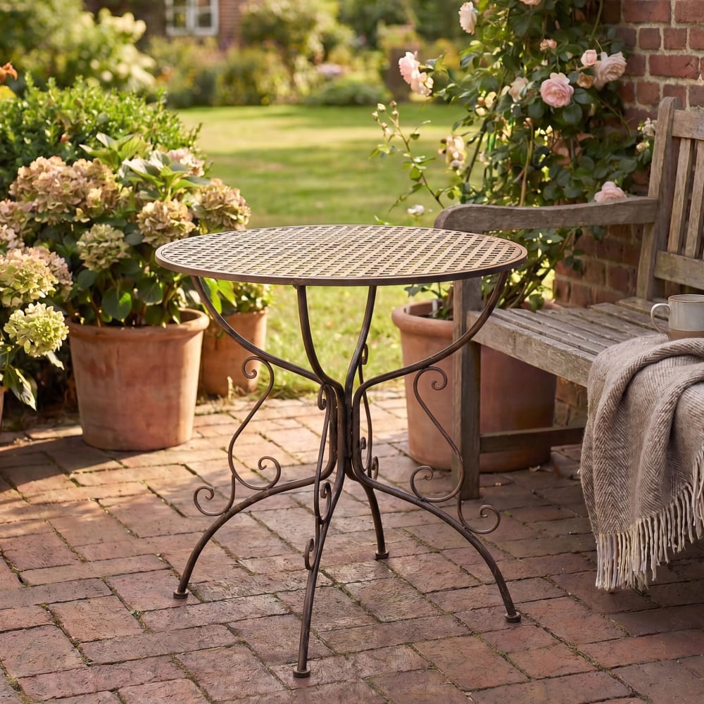 Table de jardin ronde en metall bronze - Maisons du Monde