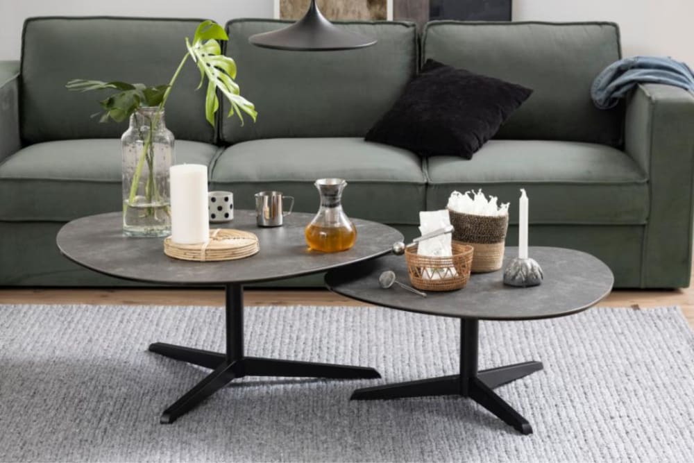 Table basse galet en céramique et pied en métal noir L100 - Maisons du Monde