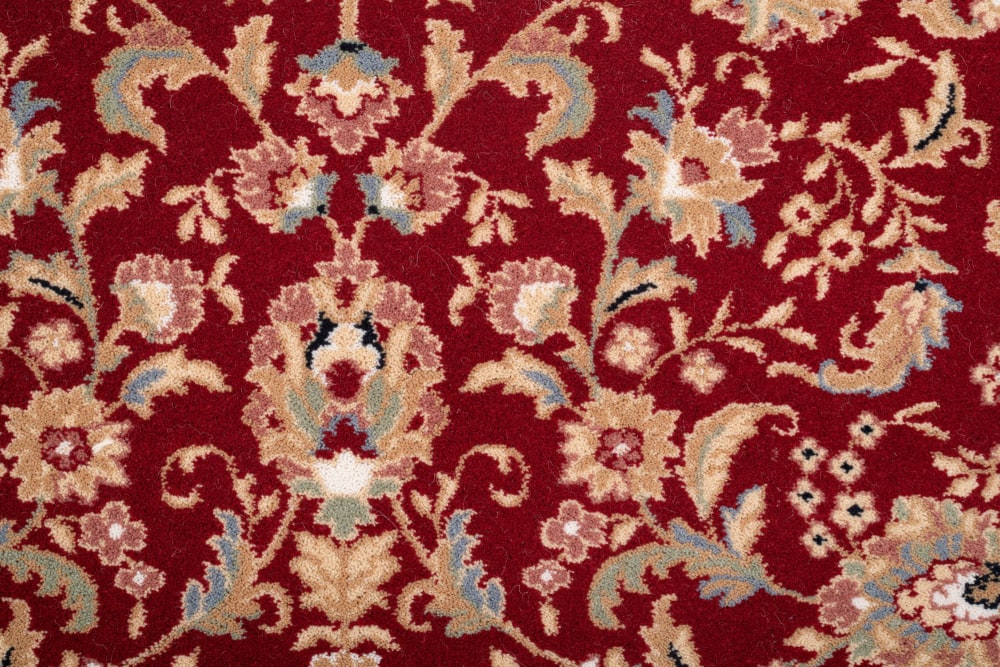 Tapis d'orient floral, tissé, laine naturelle rouge Diam 133 cm - Maisons du Monde