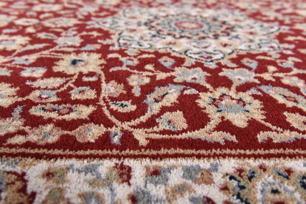 Tapis d'orient floral, tissé, laine naturelle rouge Diam 133 cm