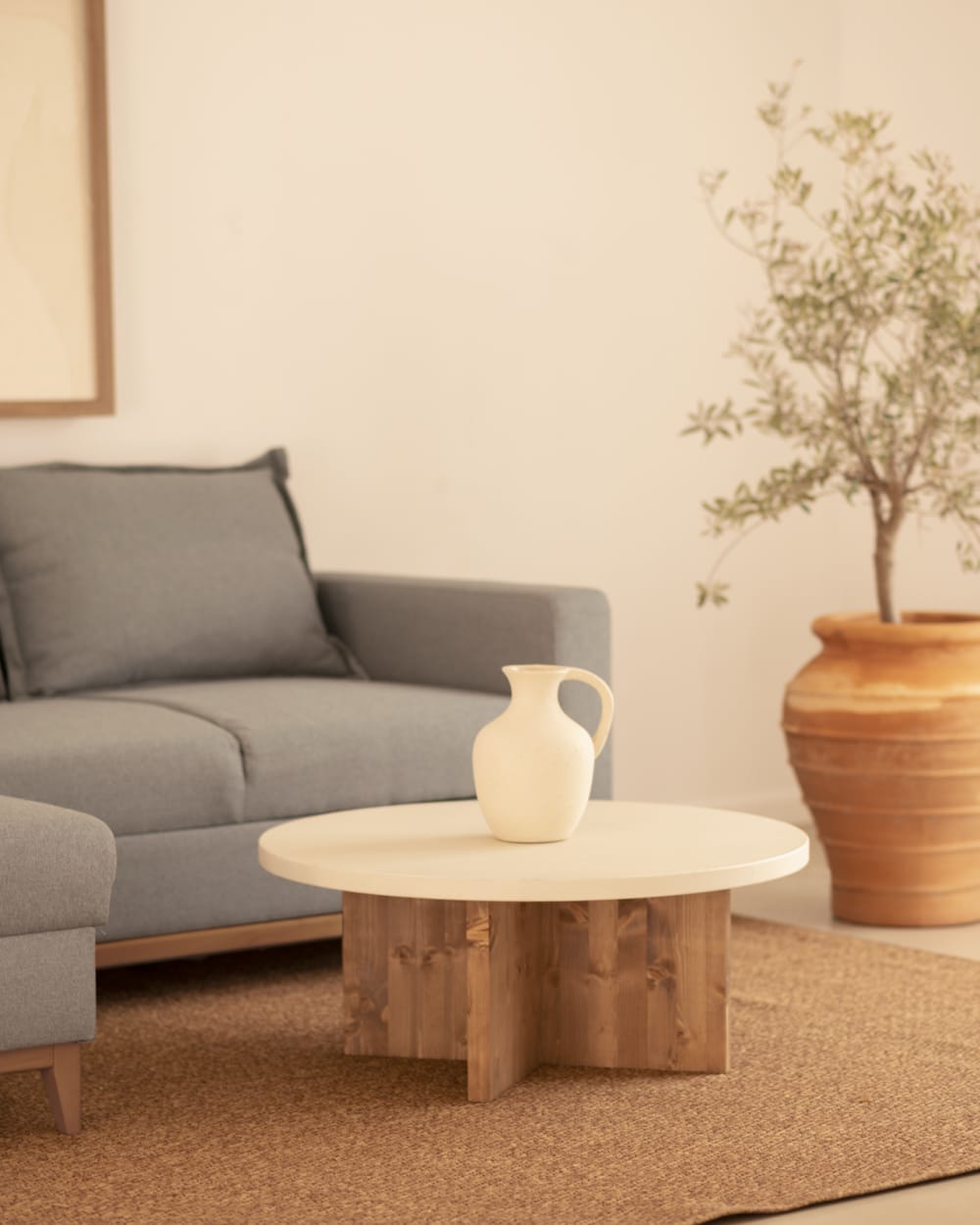 Table basse ronde en microciment blanc cassé et vieilli Ø60x33cm - Maisons du Monde