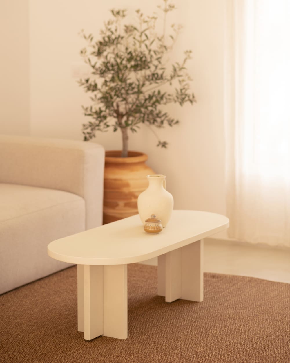 Table basse en microciment blanc cassé de 120x40cm - Maisons du Monde