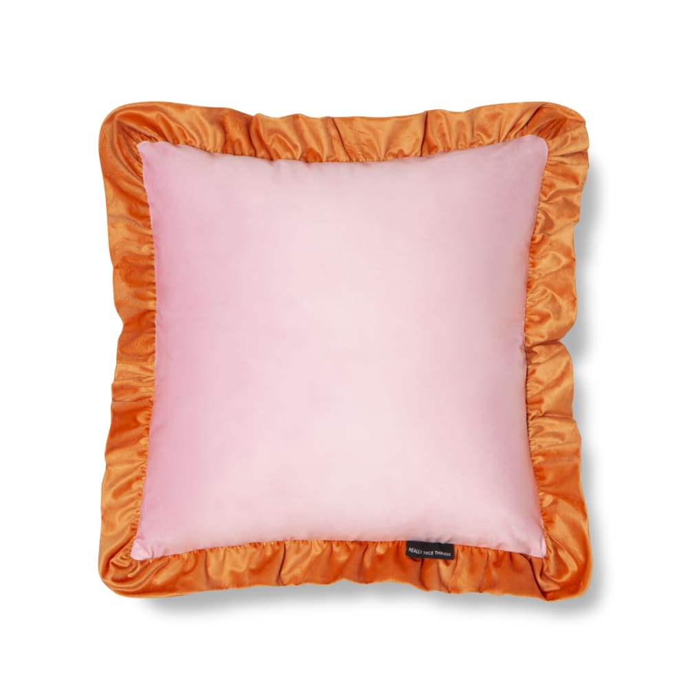 Coussin en velours avec volant plissé, orange et rose