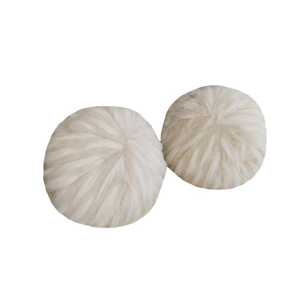Coussin balle en fausse fourrure blanche