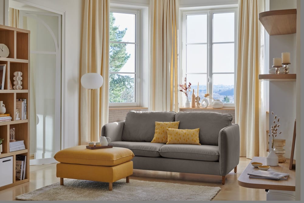 Canapé convertible en tissu gris clair
