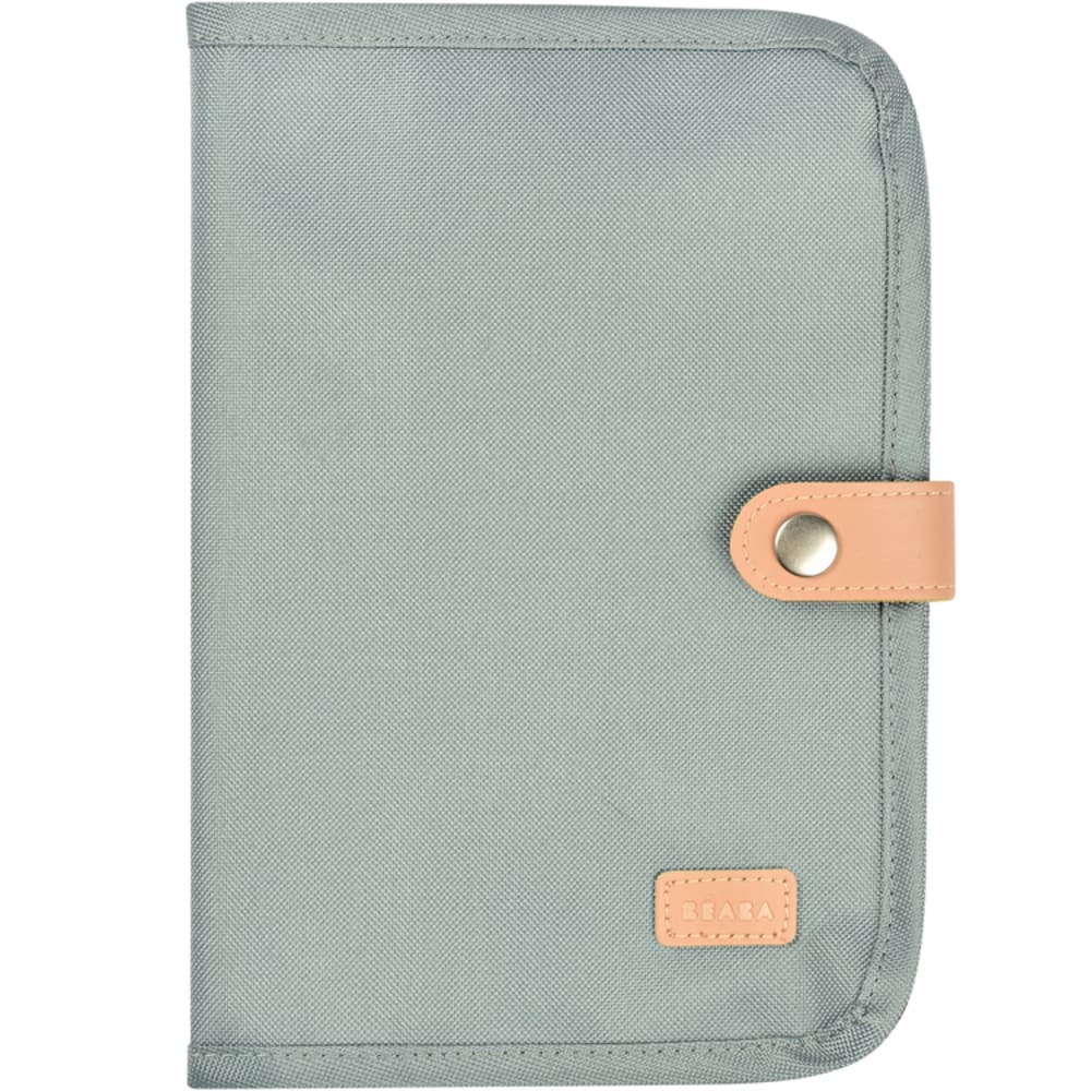 BÉABA - Fermeture par bouton pression. - Larges rabats de chaque côté. - Lavable a l'éponge . Age conseillé : Dès la naissance