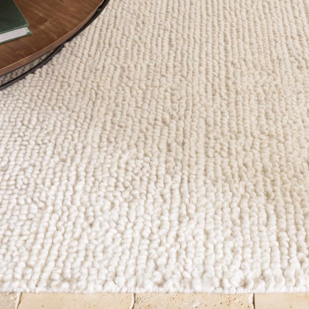 Tapis rectangulaire 160x230cm en laine bouclée couleur ivoire — vue 4