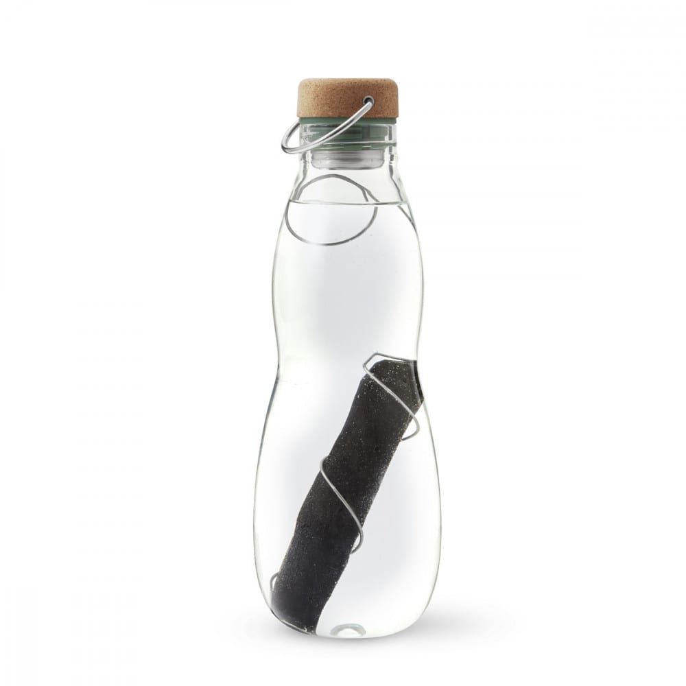 Bouteille et charbon en verre