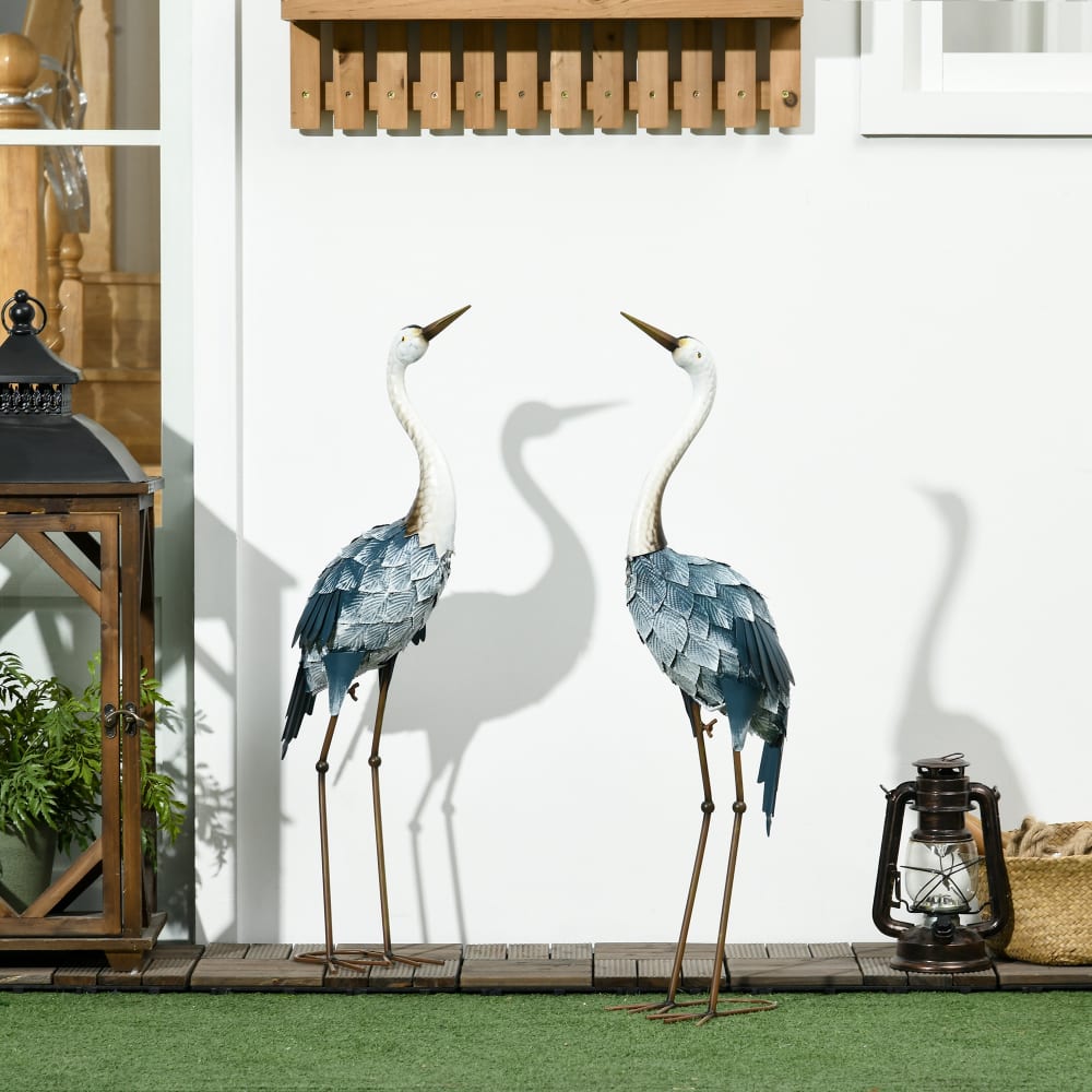 Lot de 2 statues de jardin grues h. 72/74 cm acier bleu blanc - Maisons du Monde