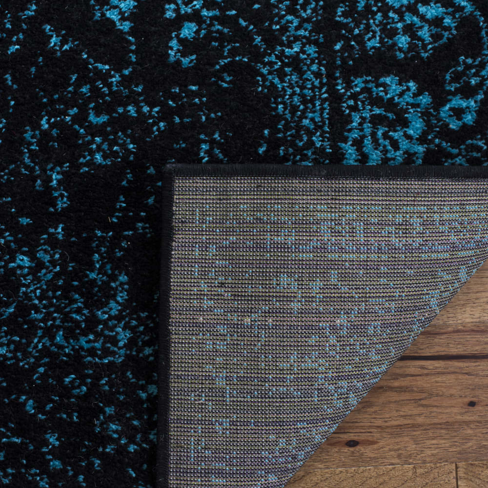 Tapis vintage patiné en polypropylène noir/bleu, 91 x 152 cm — vue 3