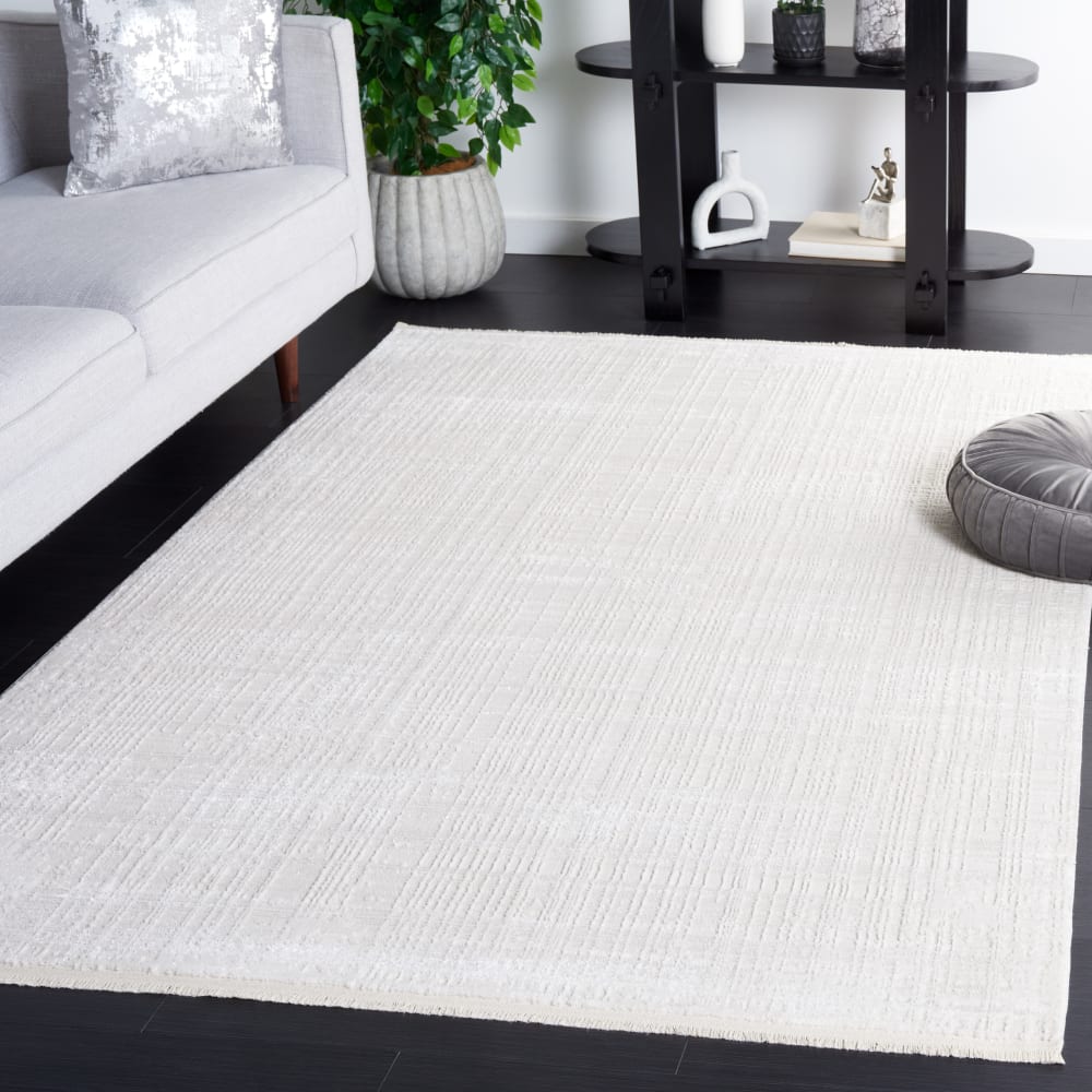 Tapis moderne en polypropylène blanc, 160 x 229 cm - Maisons du Monde