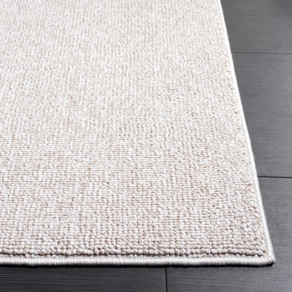 Tapis solide et tonale en polyester beige, 235 x 305 cm - Maisons du Monde
