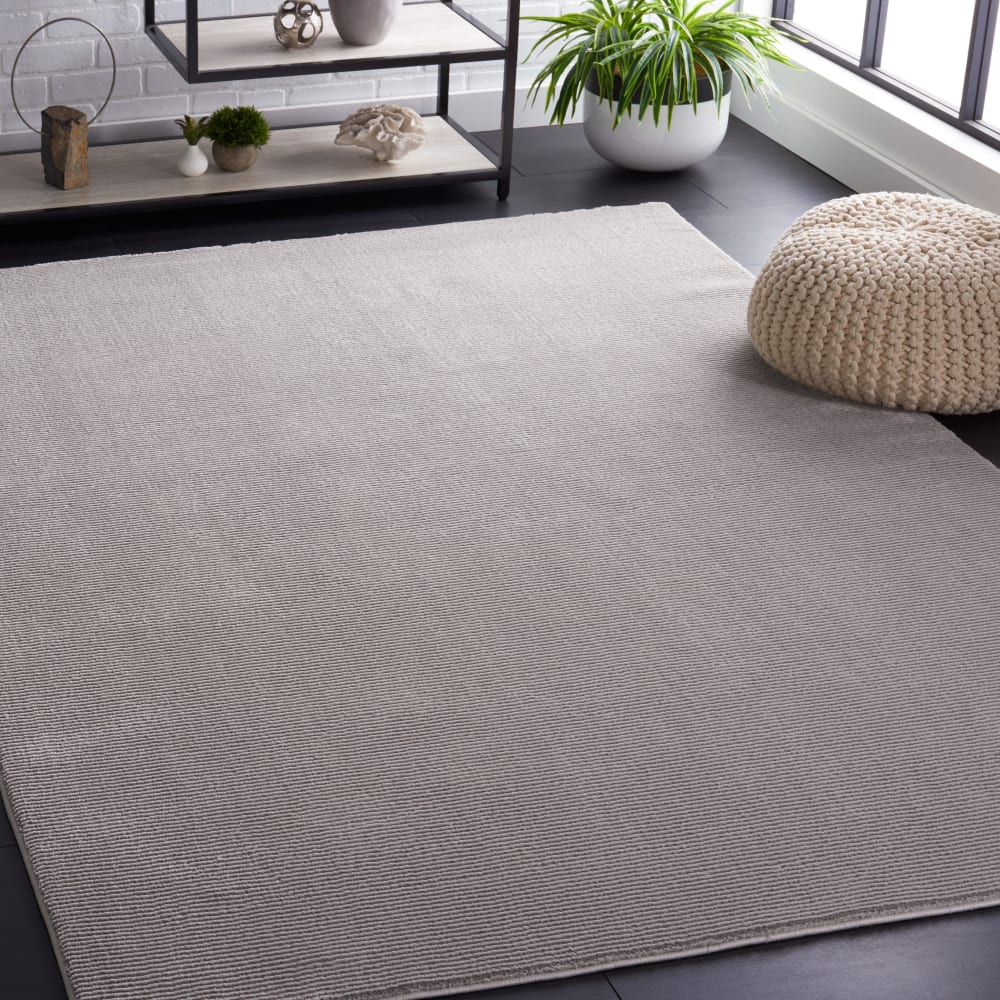 Safavieh Tapis solide et tonale en polyester gris, 235 x 305 cm style contemporain - Pes - Polyester