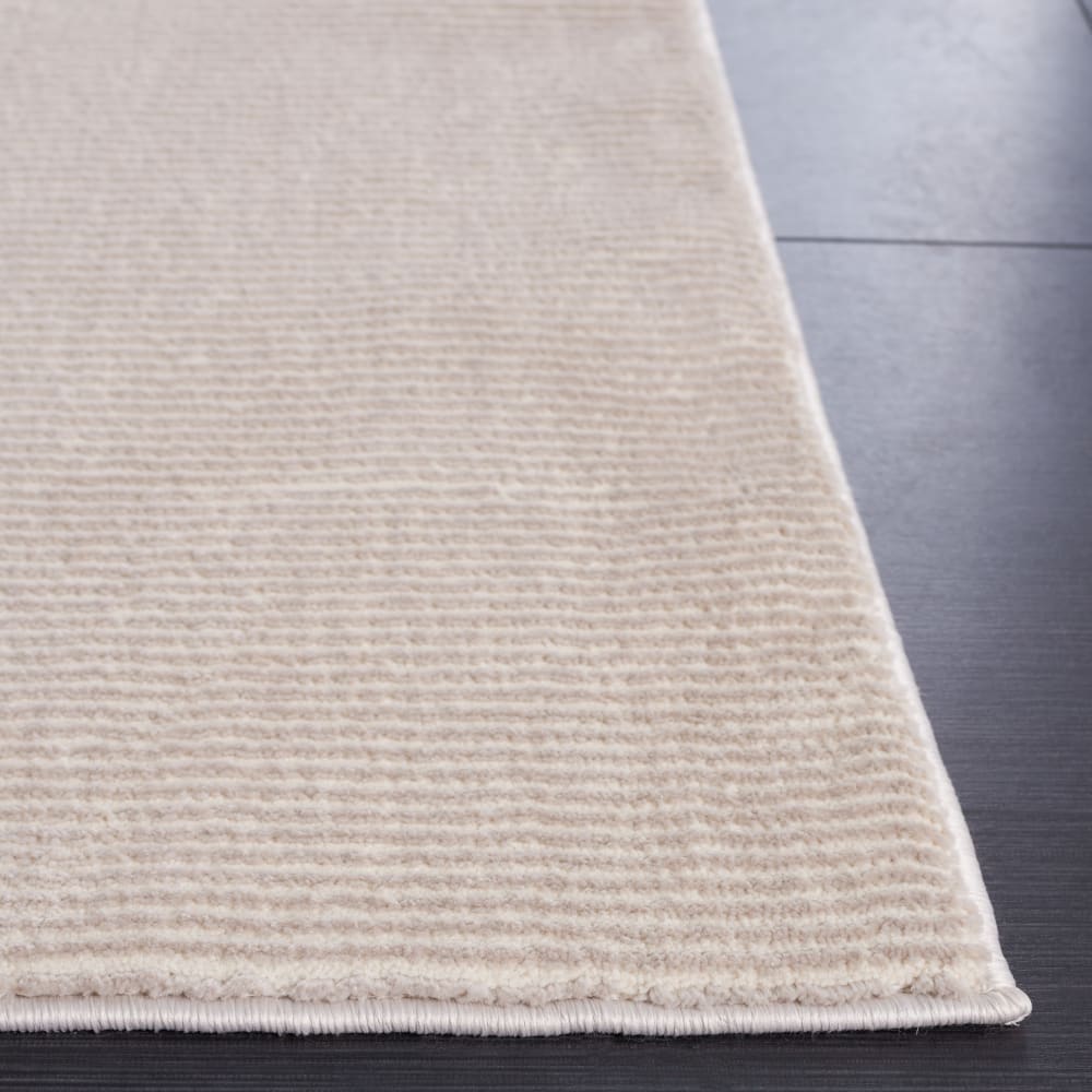 Tapis solide et tonale en polyester beige, 235 x 305 cm — vue 4