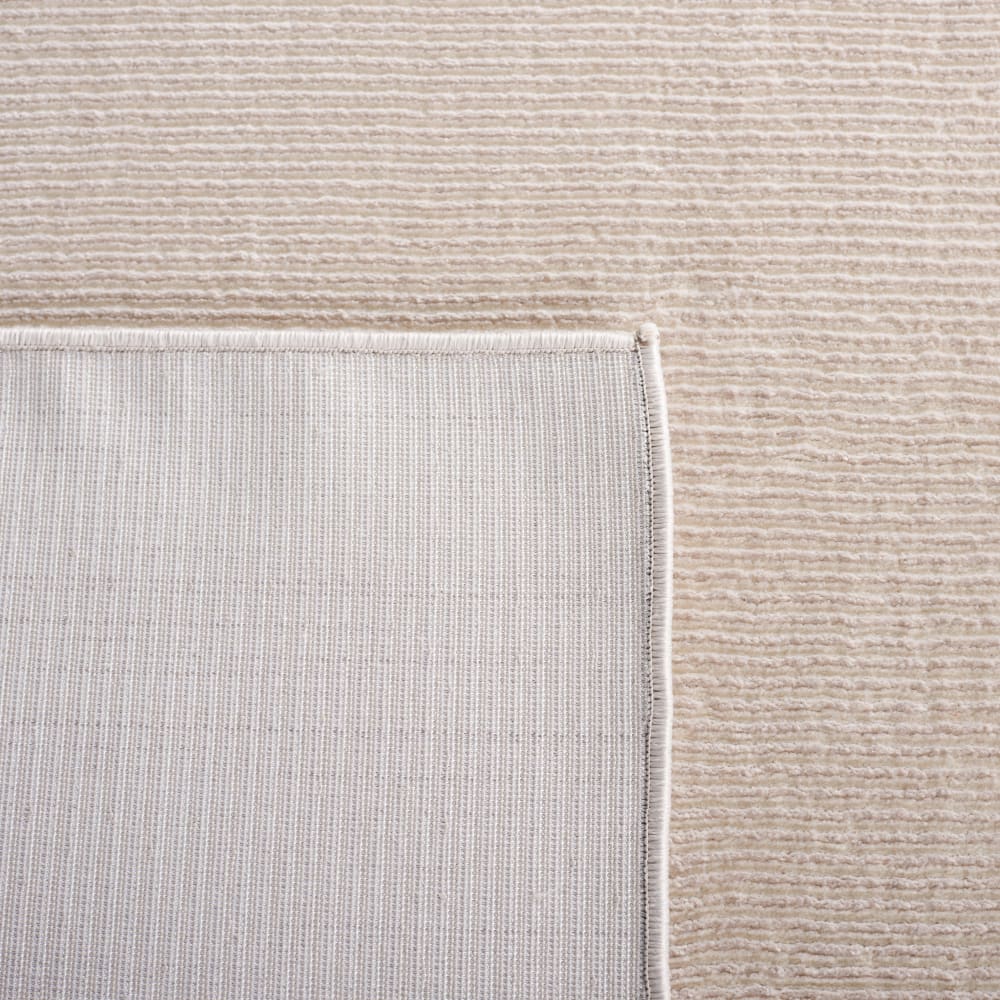 Tapis solide et tonale en polyester beige, 160 x 231 cm — vue 4