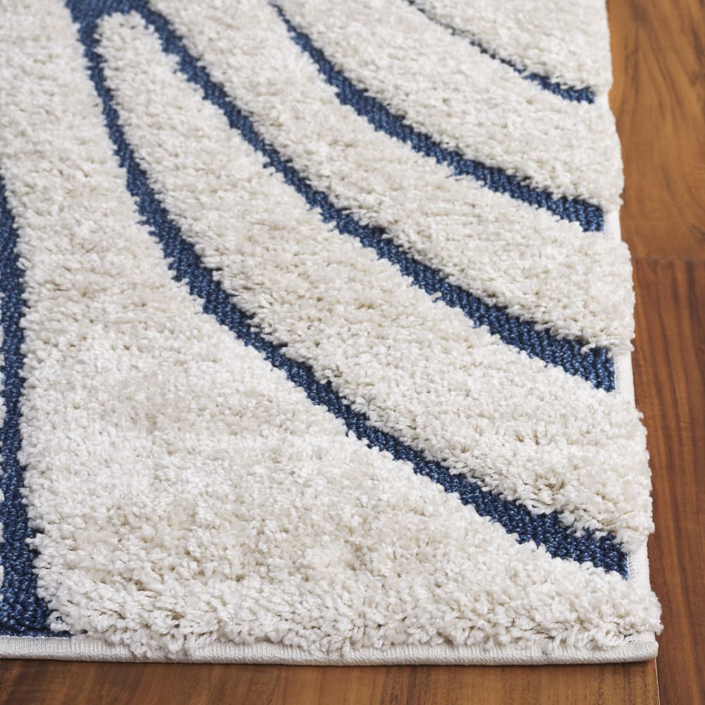 Tapis en polypropylène beige/bleu, 61 x 91 cm - Maisons du Monde