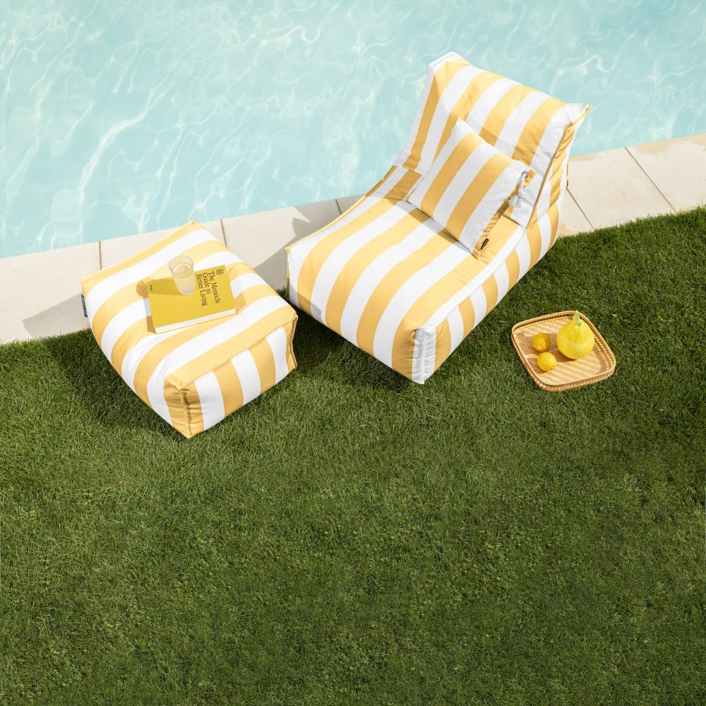 Pouf d'extérieur rayé jaune et blanc 65x100x65 cm - Maisons du Monde