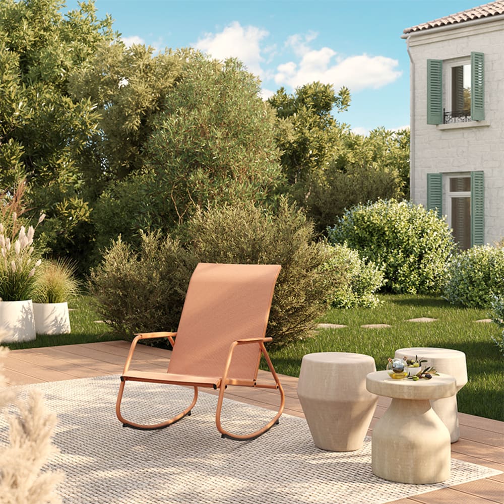 Fauteuil à bascule en acier et textilène pêche