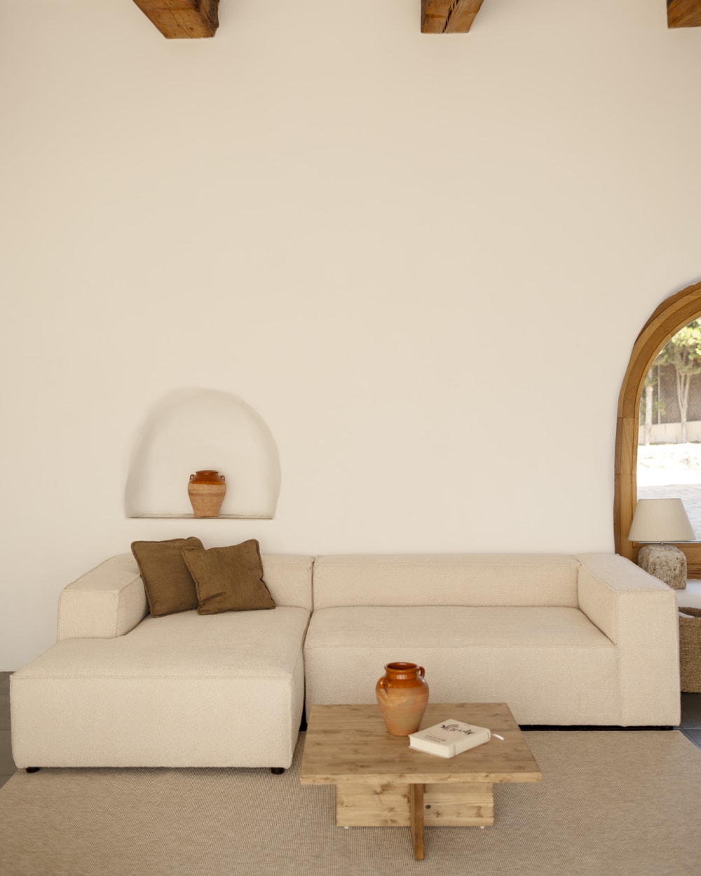 Canapé d'angle gauche 3/4 places en bouclé couleur beige 250x175cm