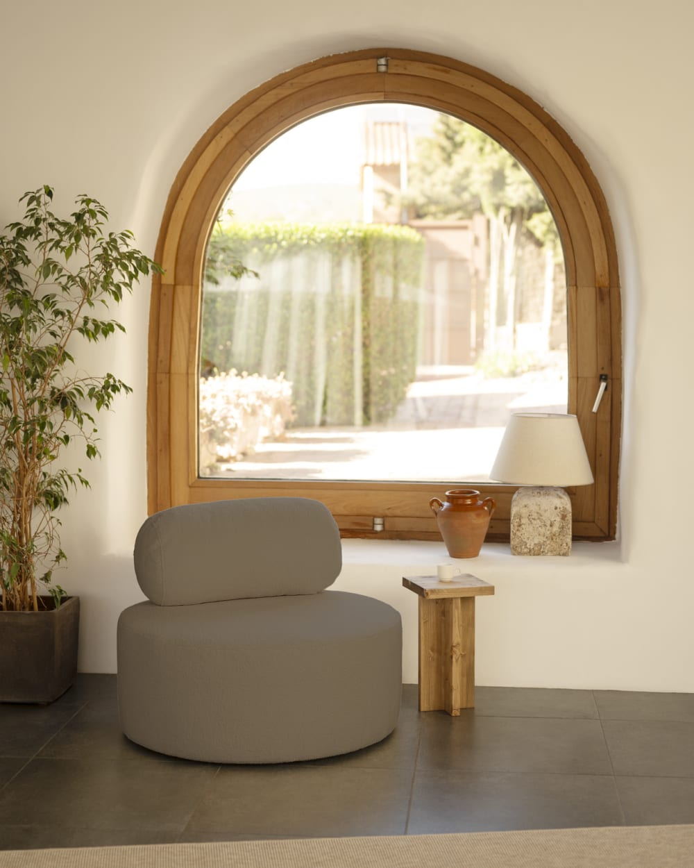 Fauteuil en bouclé rond couleur marron 105x50cm
