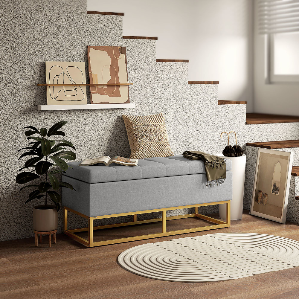 Banquette coffre de rangement acier doré assise capitonnée tissu gris
