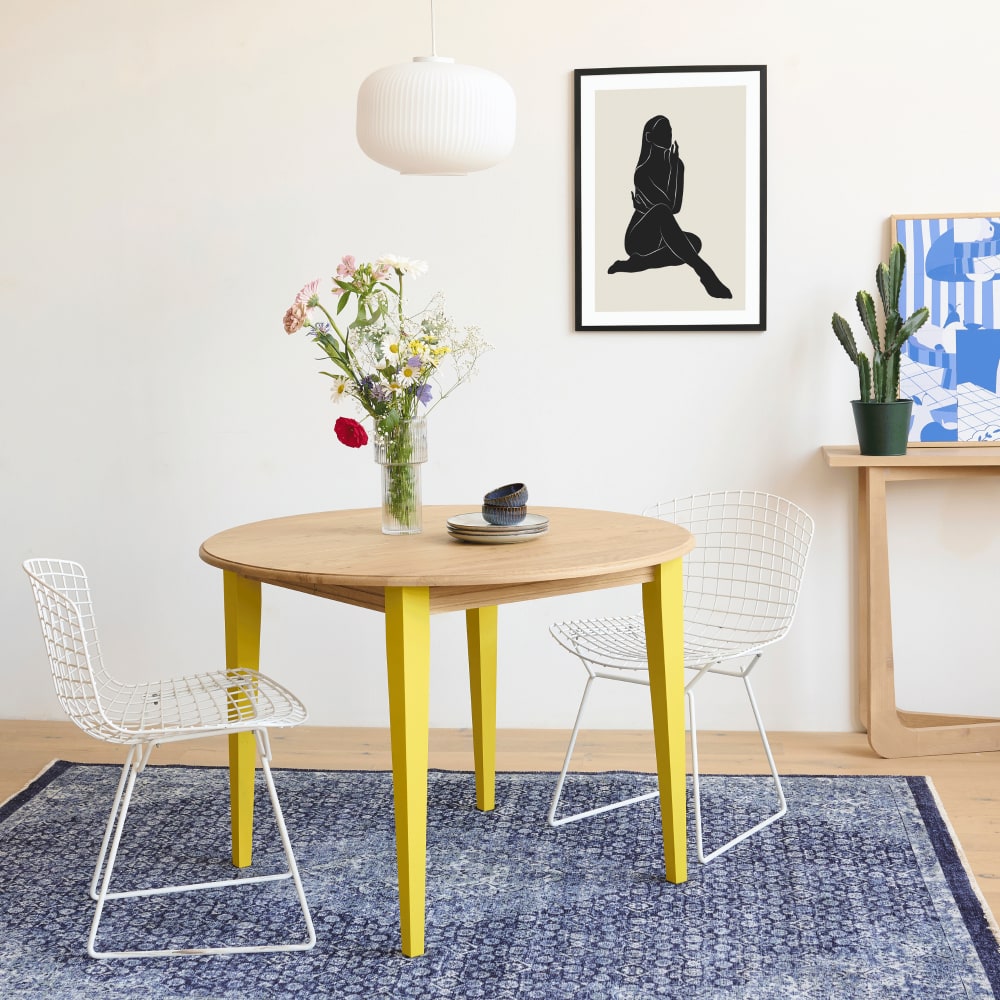 Table ronde extensible en bois 4/6 places d115 pieds jaune - Maisons du Monde