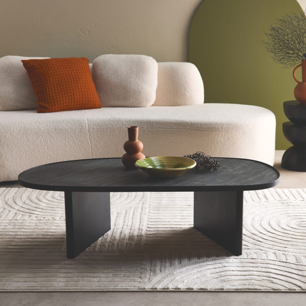 sweeek Ovaler Couchtisch aus Mangoholz und schwarzem Steinfurnier style exotic - -
