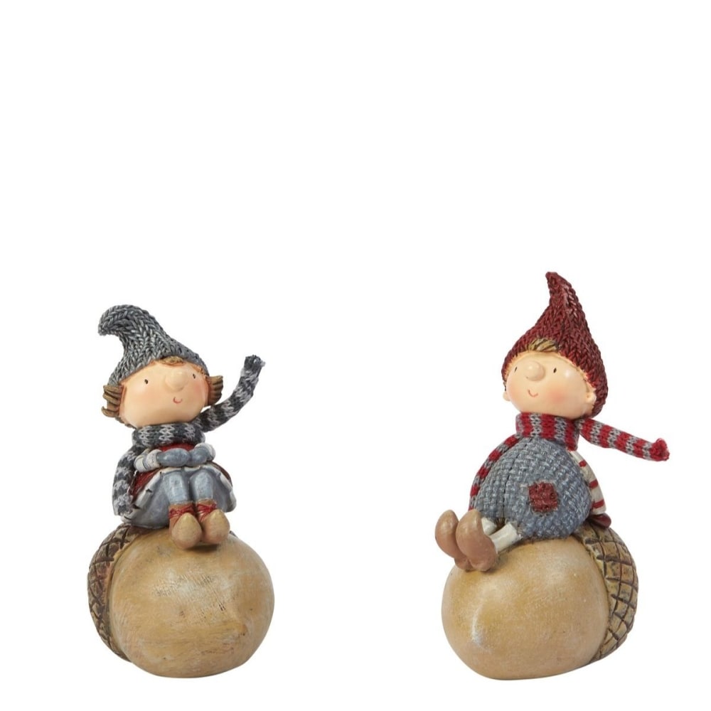 Set de 2 figuras de navidad niños sobre nuez en resina roja h10