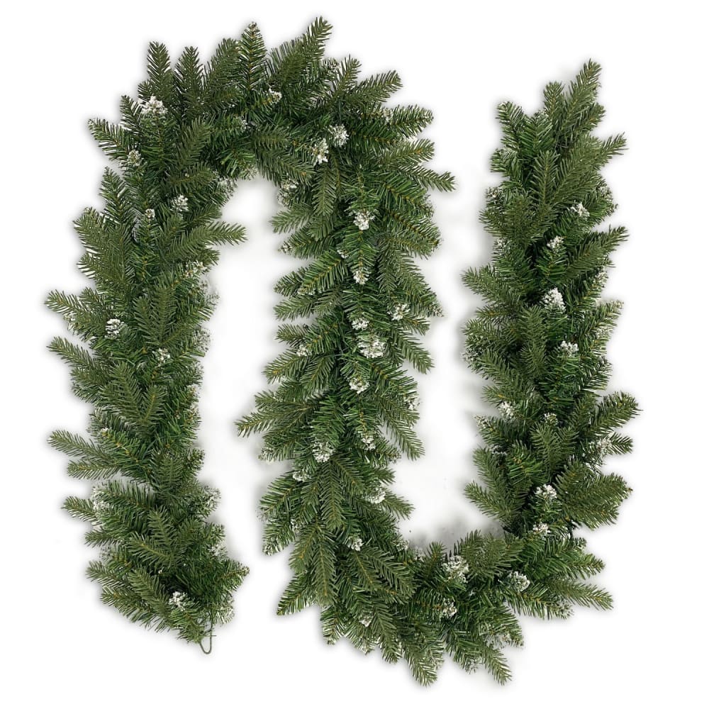 Corona de navidad en pvc verde con nieve