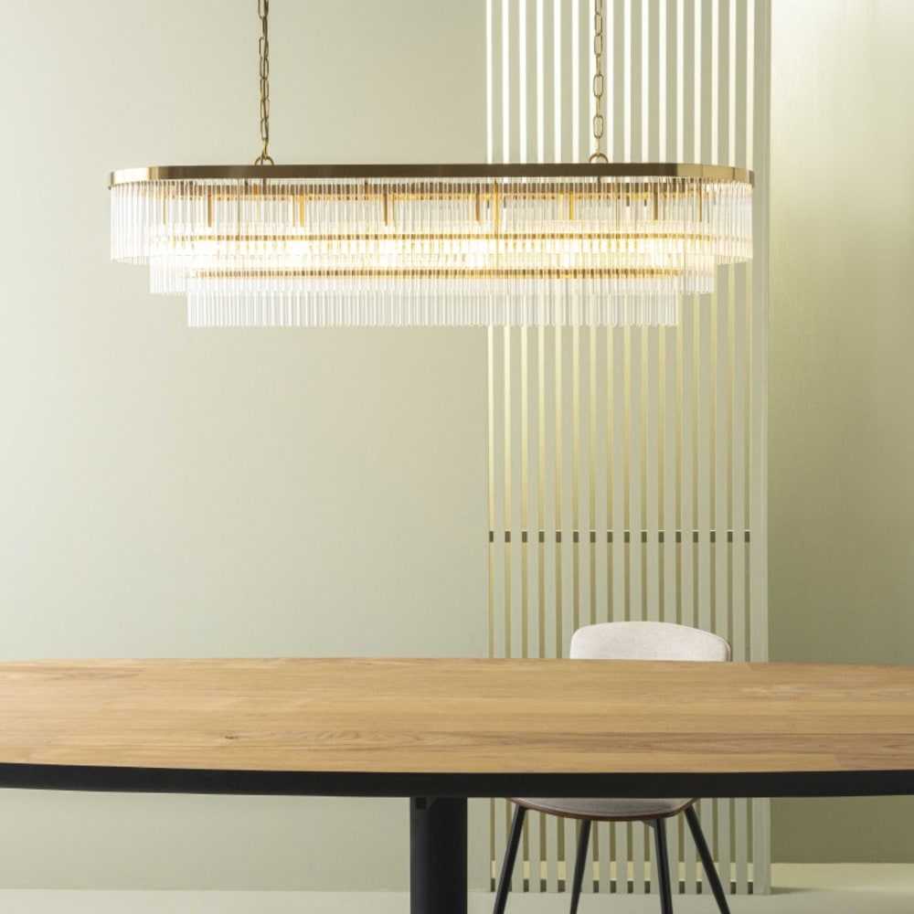 SIGNATURE Produkteigenschaften: Struktur aus goldenem Metall. Anhänger aus facettiertem Glas. Art-Déco-Stil. Gold