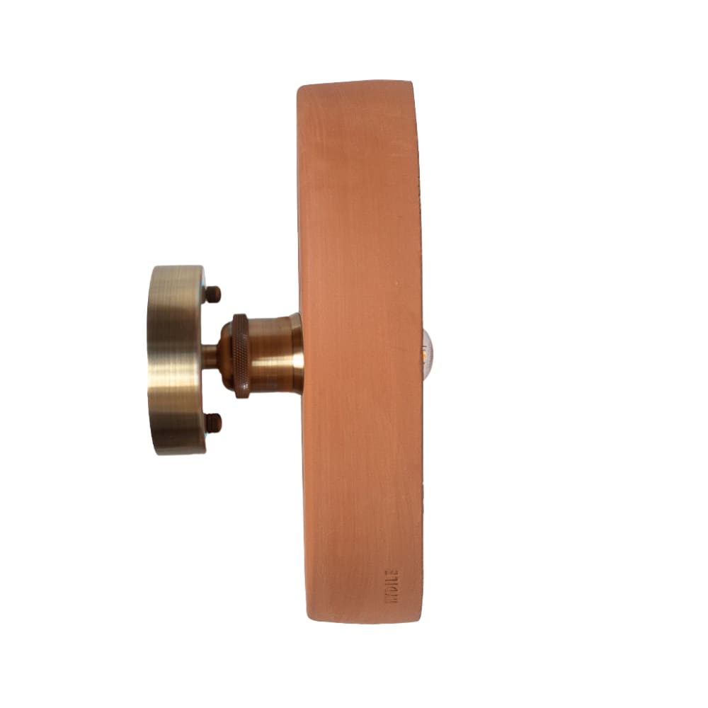 Applique murale en terre cuite ocre