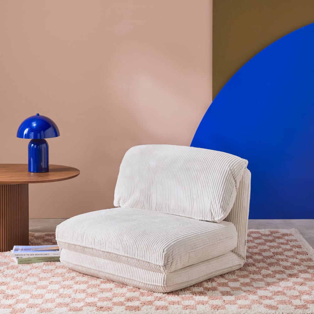 Chauffeuse convertible velours côtelé grosse côte 1 place blanc cassé