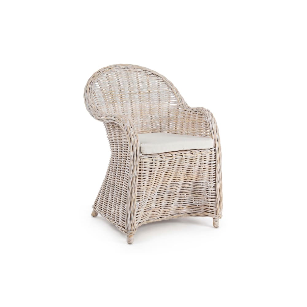 Fauteuil en rotin blanchi et coussin en coton