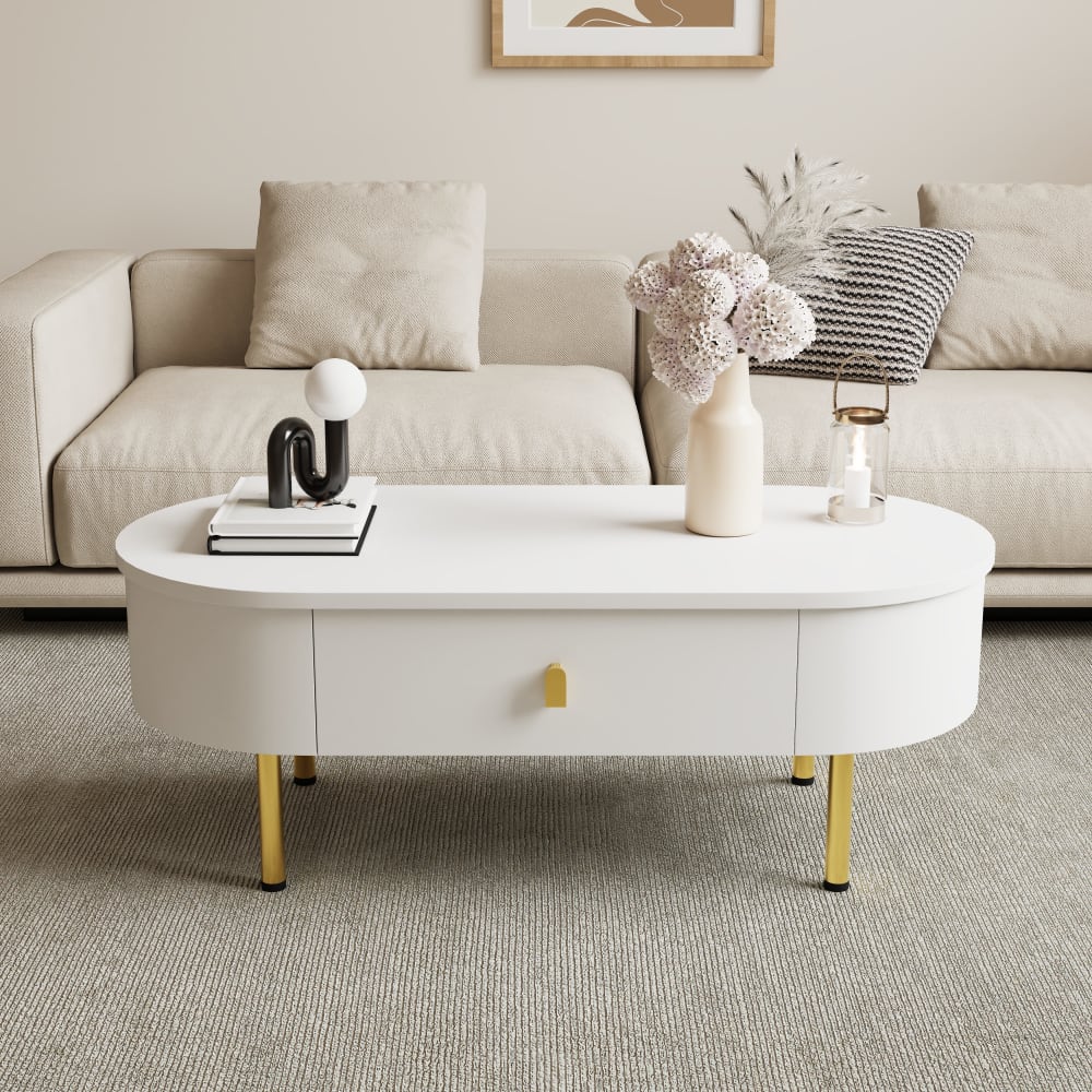 Table basse ovale blanche avec tiroirs et pieds dorés