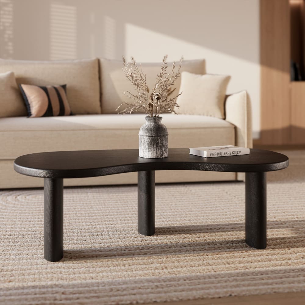 Table basse organique en bois massif de mindi noir