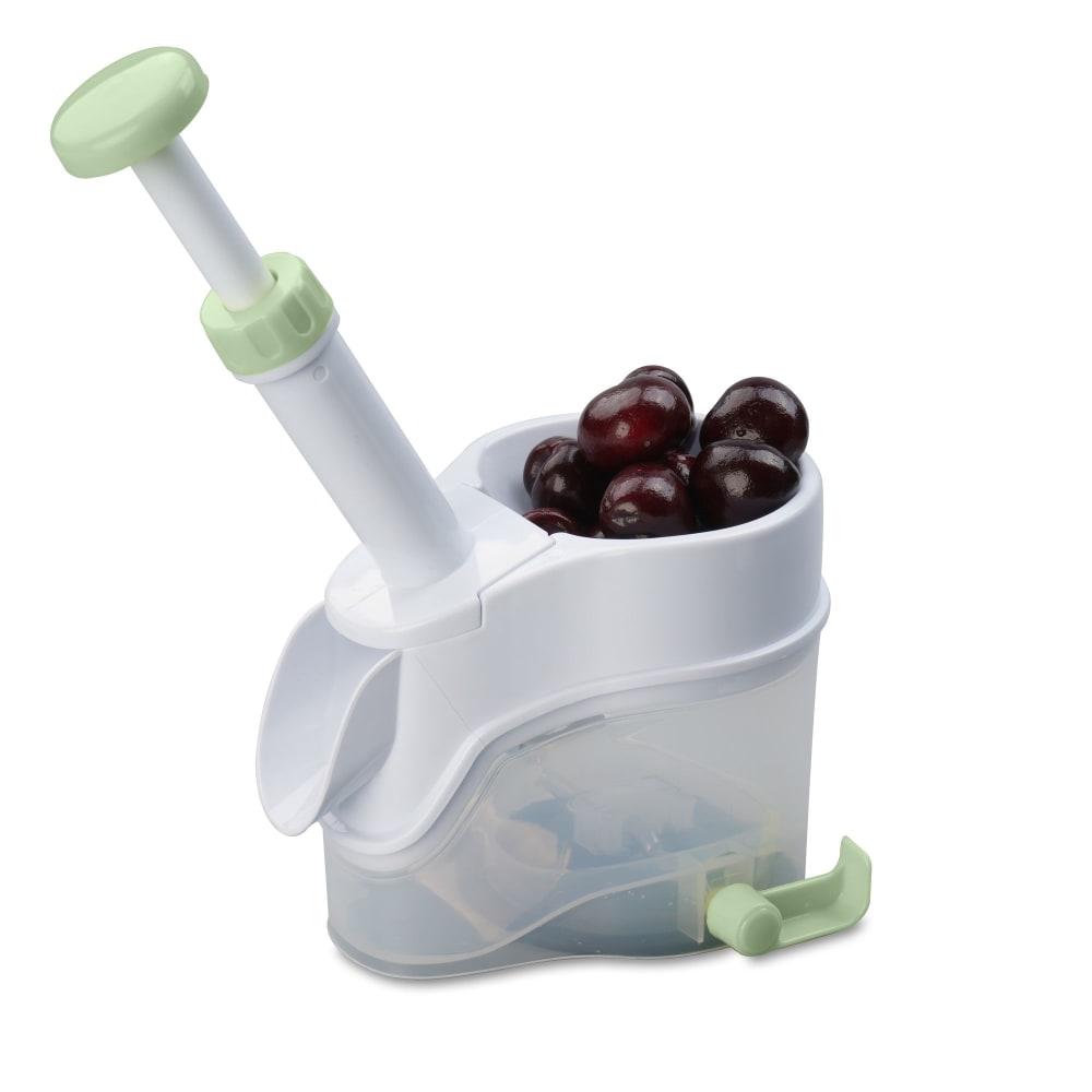 Dénoyauteur à cerise avec réservoir